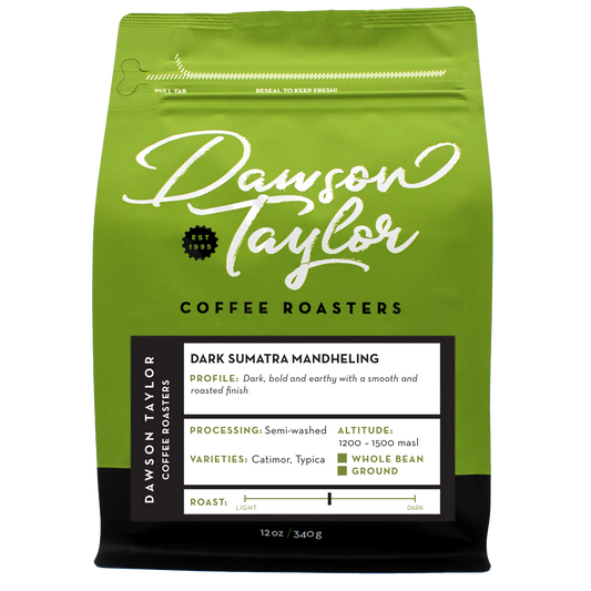 Dark Sumatra Mandheling coffee bag with green packaging and a white label listing profile processing altitude and roast