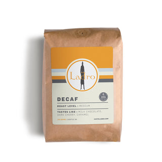 Ladro Decaf bag with orange and cream label featuring the Ladro logo and DECAF roast level