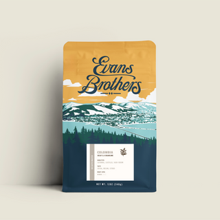 Decaf Colombia coffee bag front with Evans Brothers logo and mountain illustration