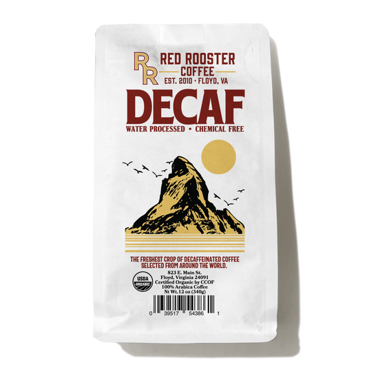 Decaf coffee bag with bold DECAF lettering and mountain illustration