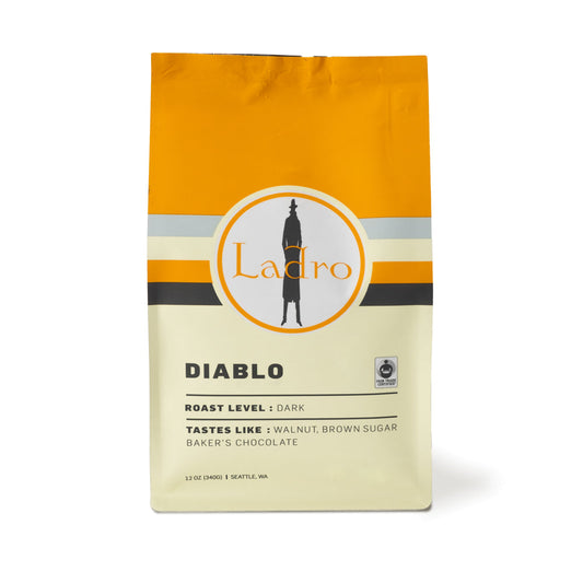 Ladro Diablo dark roast coffee bag featuring a round Ladro logo and bold orange label.