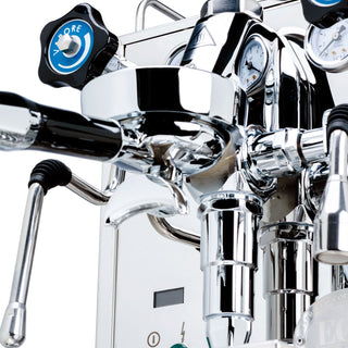 Close-up of the chrome front panel showing gauges and a blue control knob on the ECM Mechanika Slim PID espresso machine