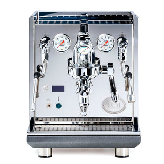 ECM Synchronika II Flow Control espresso machine front close-up showing polished chrome panel and dual gauges