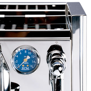 Close-up of the chrome front panel and top edge of the ECM Technika VI espresso machine