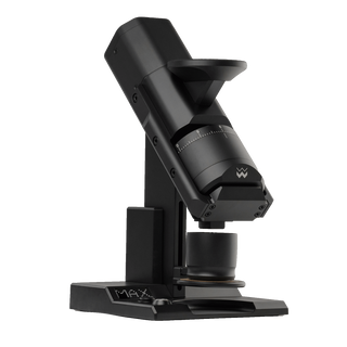Weber Workshops EG-1 flat burr grinder head close-up against a black background.