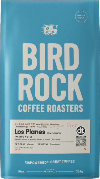 Los Planes Pacamara coffee bag from Bird Rock Coffee Roasters in bright blue packaging with a white tasting notes label