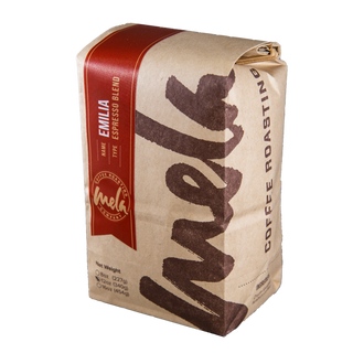 Espresso Emilia coffee bag with a bold red vertical label on kraft paper.