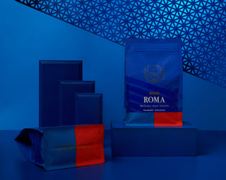 Parisi Roma espresso bag upright against a blue geometric lattice backdrop