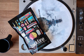 Backline Blend bag shown on a turntable with colorful illustrated graphics