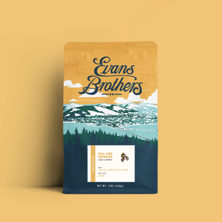 Fall Line Espresso Blend coffee bag with Evans Brothers logo and mountain artwork on orange packaging