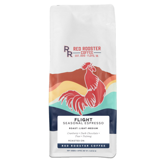Flight Seasonal Espresso bag showing rooster artwork against a multicolor background and roast details.