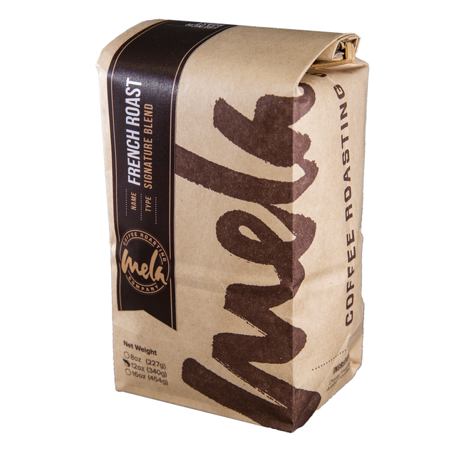 French Roast coffee bag with dark label and kraft wrap, featuring bold vertical French Roast text.