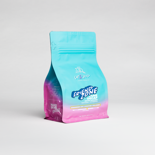 Turquoise disposable face mask against a light gray backdrop