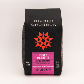 Funky Mamacita coffee bag by Higher Grounds with pink label on a dark bag.