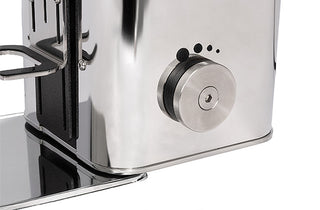 Close-up of the ECM Exacto grinder's grind adjustment knob on a white background.