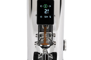 ECM Exacto grinding coffee 