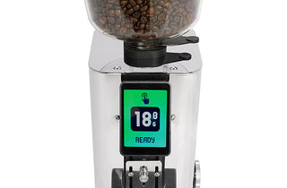 ECM Exacto Coffee grinder with digital display showing '18g' and 'ready' on a white background