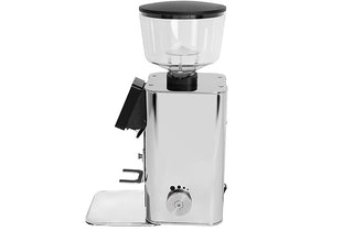 Profile view of the ECM Exacto coffee grinder with a polished stainless steel body, clear hopper fand a black lid, shown against a plain white background.