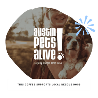 Smiling person holding a dog with an Austin Pets Alive circular logo overlay