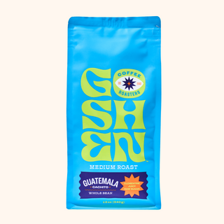 Blue Guatemala Cachito coffee bag with bold yellow graphic and roast indicator reading medium roast.