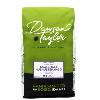 Guatemala Huehuetenango MAM coffee bag from Dawson Taylor with bright green packaging and white script logo