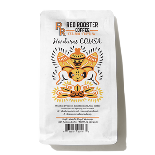Honduras COMSA Marcala coffee bag with bold colorful motif and COMSA branding on a white package