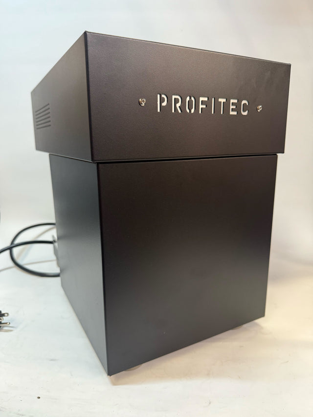 Side view of Profitec MOVE espresso machine in black metal housing