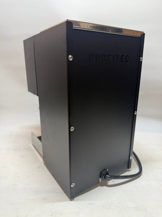 Side view of black Profitec GO espresso machine with visible screws and chrome top edge