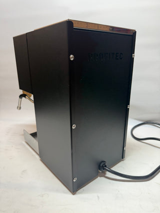 Open Box Profitec GO espresso machine side view in black with power cord visible.