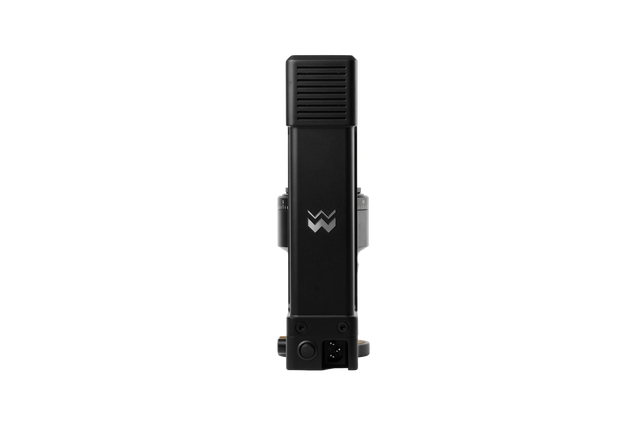 Close up of The Key compact coffee grinder head in black with a ribbed vented top.