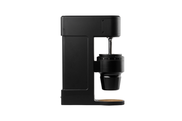Side view of The Key Mk2 compact grinder with burr mounting area and adjustable dial.