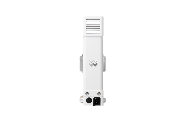 Front view of The Key Mk2 compact grinder with vented head and white body showing the logo on the lower front.