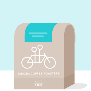La Piramide Colombia packaging with turquoise backdrop beige curves and Tandem branding