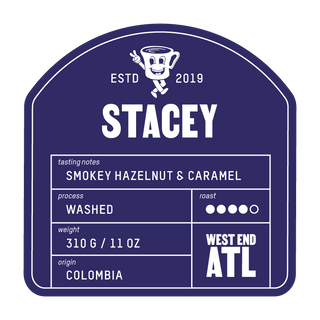 Close up of the STACEY label on a purple bag showing smoky hazelnut and caramel tasting notes