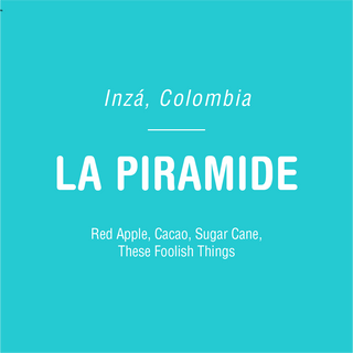 La Piramide coffee package on turquoise background with large LA PIRAMIDE text and origin notes