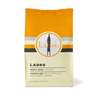 Ladro Espresso Blend bag with bold orange top and round Ladro logo on the label