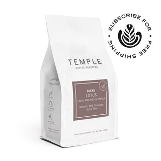 Lotus Blend coffee bag showing Latin America Africa label and almond milk chocolate stone fruit notes on white packaging