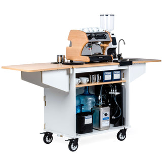 Mobile coffee cart with curved wooden shell around LUCCA espresso machine cups on top and sink at the end