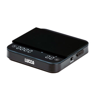 Front angled view of LUCCA Precision Scale with glossy black surface and illuminated digital readout.