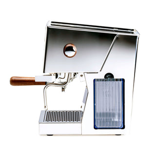 Side view of LUCCA Tempo espresso machine showing a copper ring around a circular access port and a wood handle portafilter.