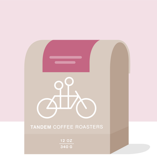 Burundi Munkaze coffee bag beige with white bicycle graphic from Tandem Coffee Roasters.