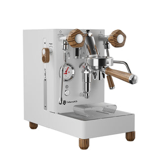 Lelit MaraX3 espresso machine with wood accents, chrome body, portafilter mounted and steam wand visible