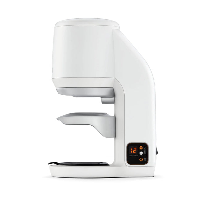 Side view of the PuqPress Mini Automatic Tamper in white knockout by Clive Coffee