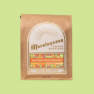 Nelson Fabio Cordoba washed coffee bag from El Silencio Huila on a lime backdrop