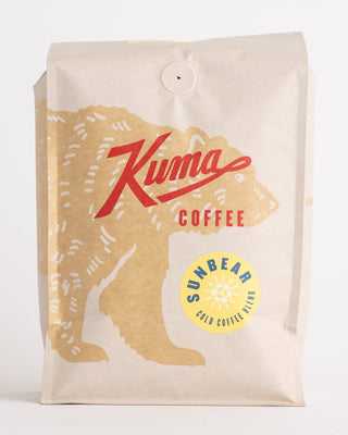 Sun Bear Cold Coffee Blend bag in kraft paper with bold red King logo and yellow Sun Bear badge.