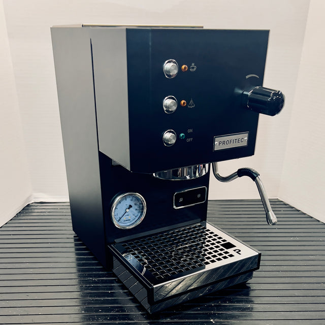Profitec GO espresso machine front panel with blue finish and chrome control knobs