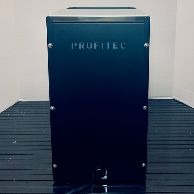 Back view of the Profitec GO machine showing blue side panel with screws and minimal controls.