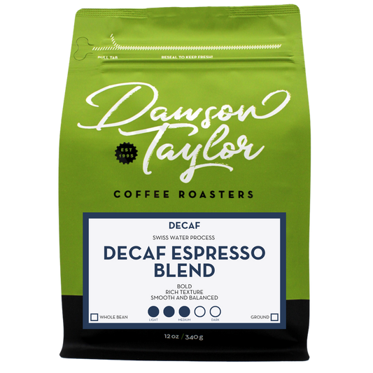 Green bag shows a blue framed label for Decaf Espresso Blend with Swiss Water Process