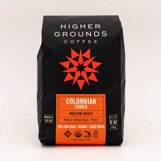 Higher Grounds Colombian Cauca coffee bag with bold orange label and red star emblem