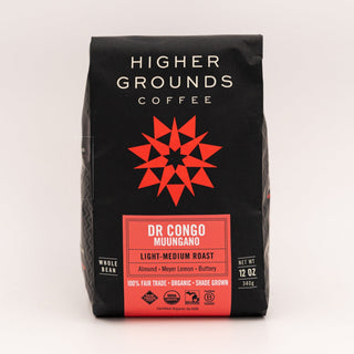 DR Congo Muungano coffee bag with red label and almond Meyer Lemon butter notes on a black bag